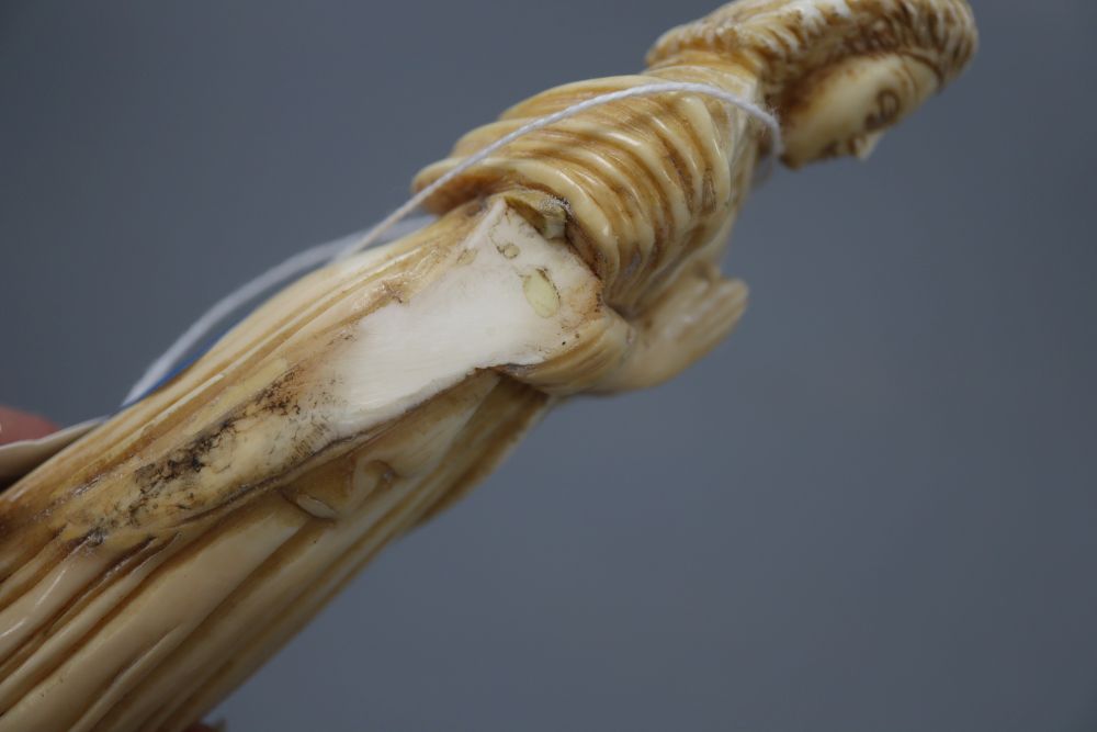 An 18th century Indo-Portuguese ivory carving of a saint, height 14cm